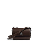 Saint-Clair Mini Clutch in Marronnier Symphonie leather